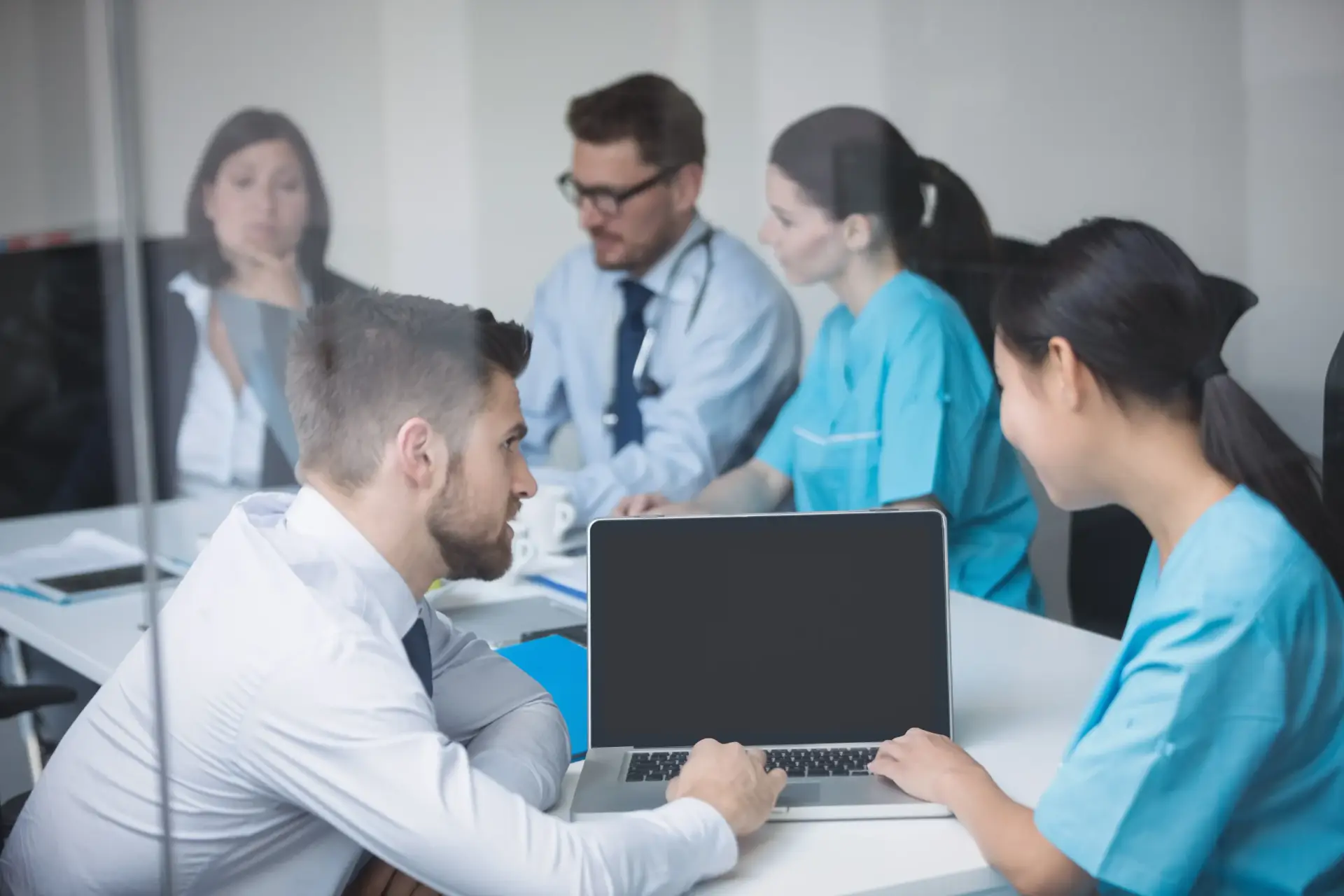 Clinical team reviewing dashboards together