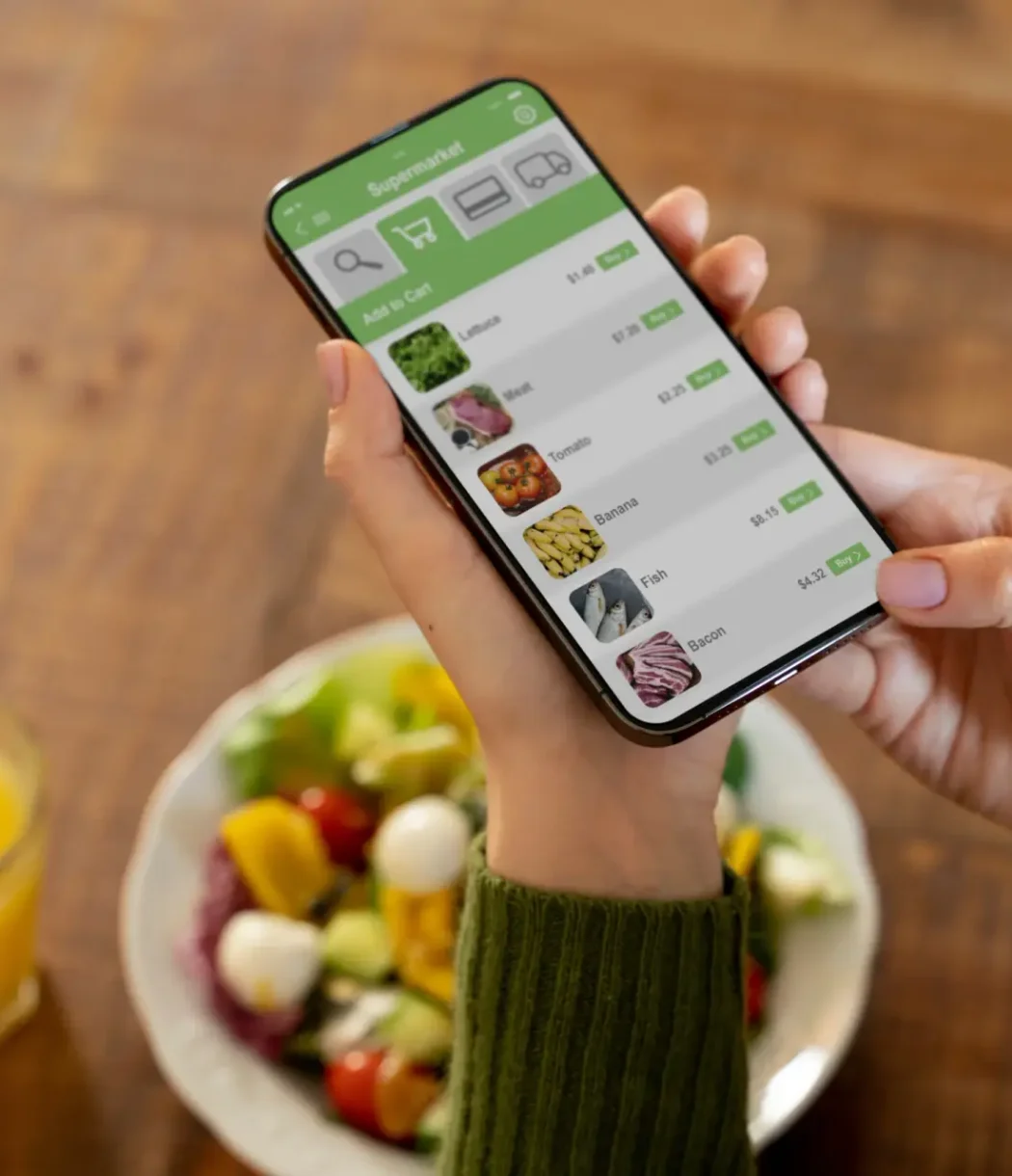 woman buying fruits online using her smartphone (1) woman buying fruits online using her smartphone (1)